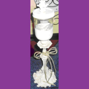 Small mason jar on a candelabra