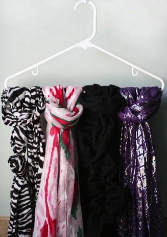 Photo Courtesy of Loop Over Non-stick Hangers: Courtesy: I Dream of Clean http://idreamofclean.net/how-to-organize-scarves/ 